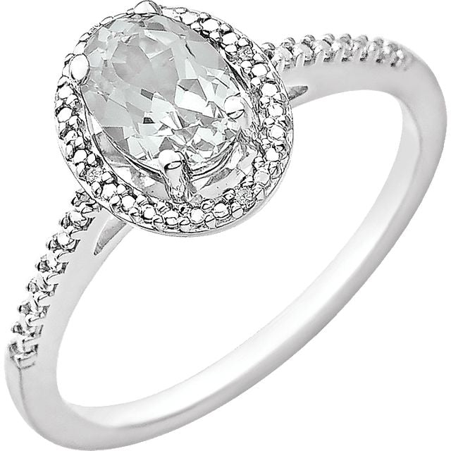Oval .01 CTW Diamond Halo Birthstone Ring in .925 Sterling Silver