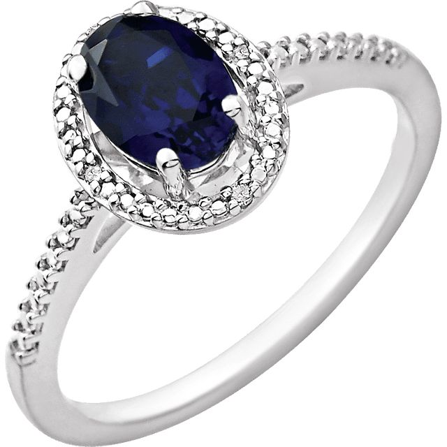 Oval .01 CTW Diamond Halo Birthstone Ring in .925 Sterling Silver