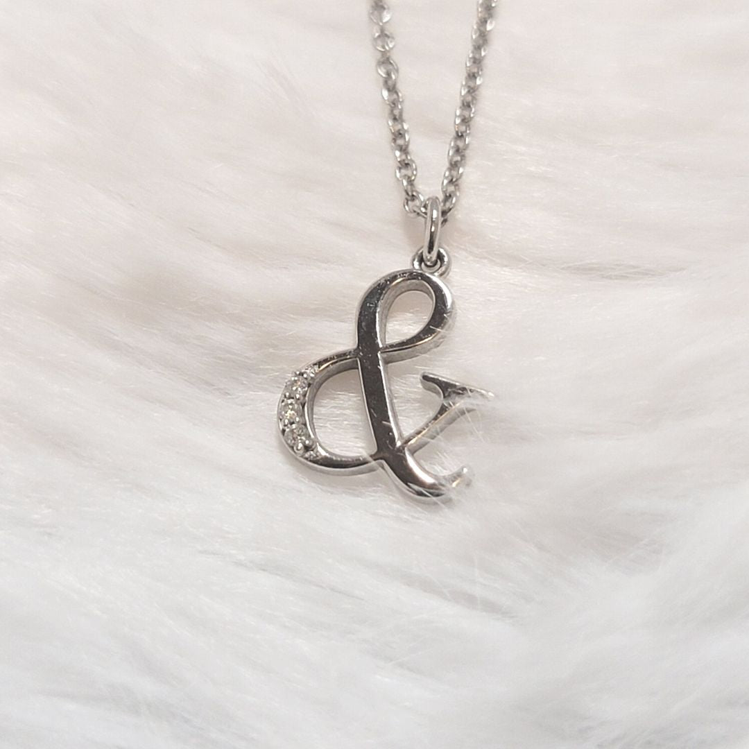 Ampersand 14k White Gold Necklace with Three Diamond Accents on a soft white background