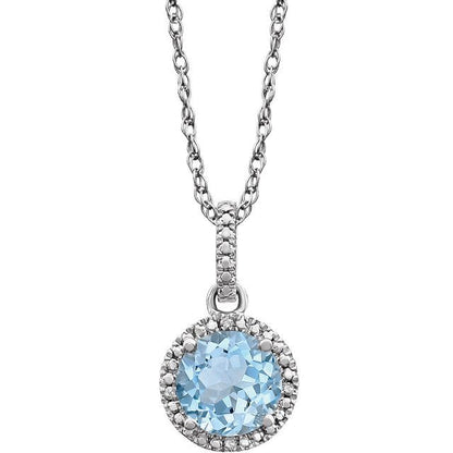 December Sky Blue Topaz Round .01 CTW Diamond Halo Birthstone Solitaire Necklace in .925 Sterling Silver